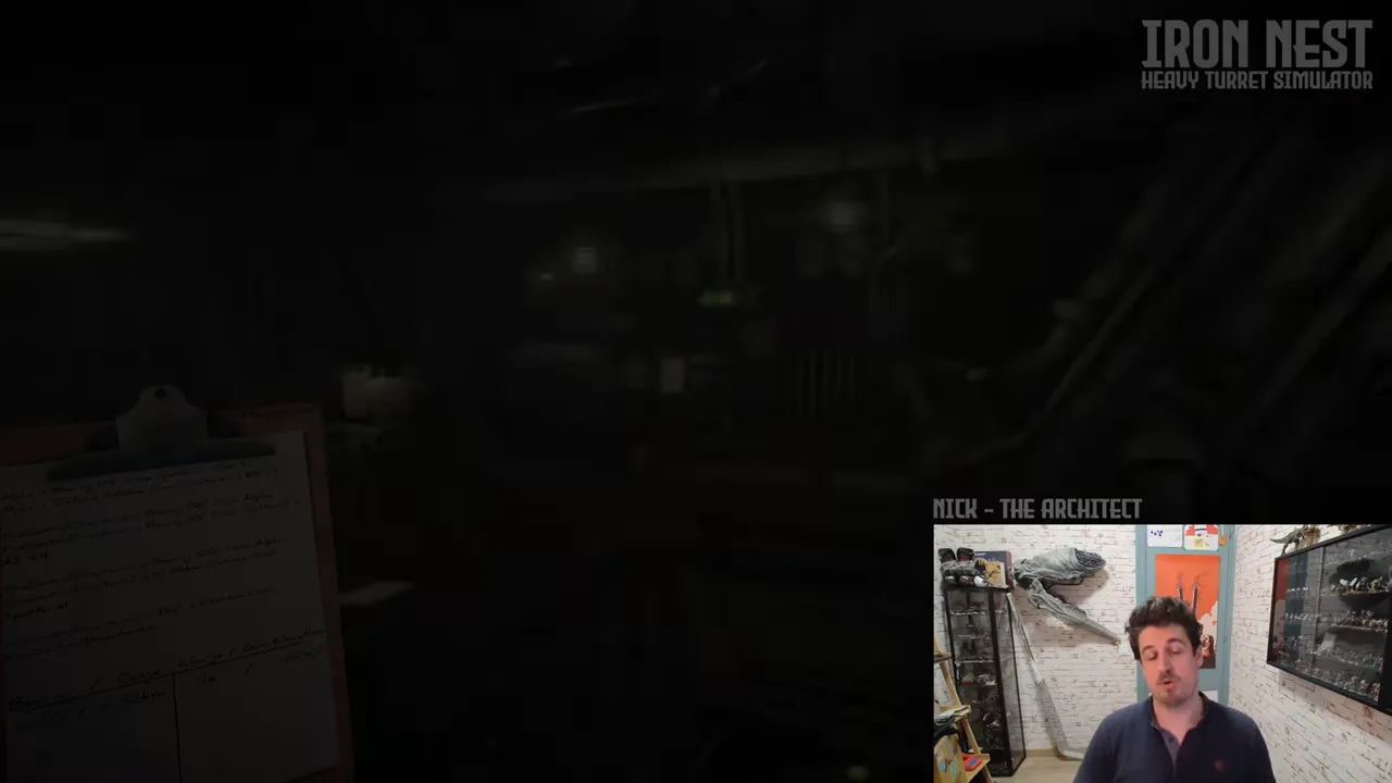 Official IRON NEST behind-the-scenes video frame showing the developer at the industrial map-and-machine workspace.